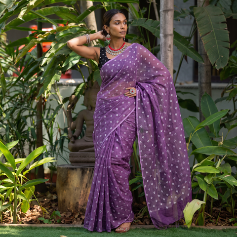 Purple Bandhani tie-dye Kota Doria cotton saree, draped and worn by a woman, by artisan Adil Hussain, AI visual of the saree, iTokri