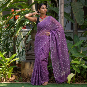 Purple Bandhani tie-dye Kota Doria cotton saree, draped and worn by a woman, by artisan Adil Hussain, AI visual of the saree, iTokri