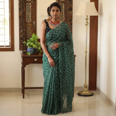 Green Bandhani tie-dye Kota Doria cotton saree, draped and worn by a woman, by artisan Adil Hussain, AI visual of the saree, iTokri