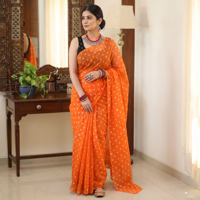 Orange Bandhani tie-dye Kota Doria cotton saree, draped and worn by a woman, by artisan Adil Hussain, AI visual of the saree, iTokri