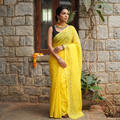 Yellow Bandhani tie-dye Kota Doria cotton saree, draped and worn by a woman, AI visual of the saree, iTokri