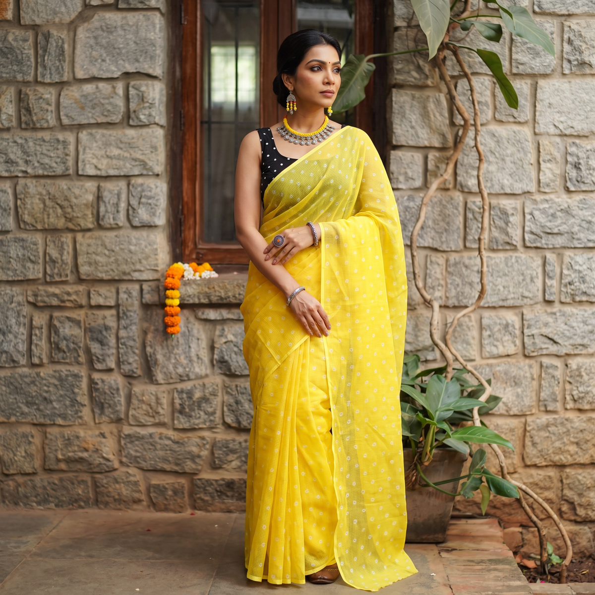 Yellow Bandhani tie-dye Kota Doria cotton saree, draped and worn by a woman, AI visual of the saree, iTokri