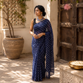 Blue Bandhani tie-dye Kota Doria cotton saree, draped and worn by a woman, by artisan Adil Hussain, AI visual of the saree, iTokri