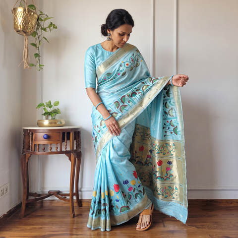 Blue Bangalore Silk Zari Border Saree, draped and worn by a woman, AI visual of the saree, iTokri