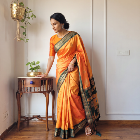 Orange Bangalore Silk Zari Border Saree, draped and worn by a woman, AI visual of the saree, iTokri