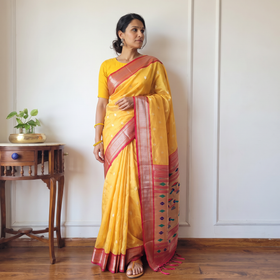 Yellow Bangalore Silk Zari Border Saree, draped and worn by a woman, AI visual of the saree, iTokri
