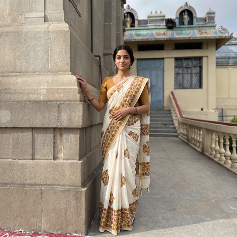 Brown Barmer Applique Work Chanderi Silk Saree with Tassels, draped and worn by a woman, AI visual of the saree, iTokri
