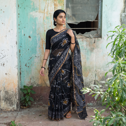 Black Batik Hand Block Print Kota Doria Cotton Saree, draped and worn by a woman, AI visual of the saree, iTokri
