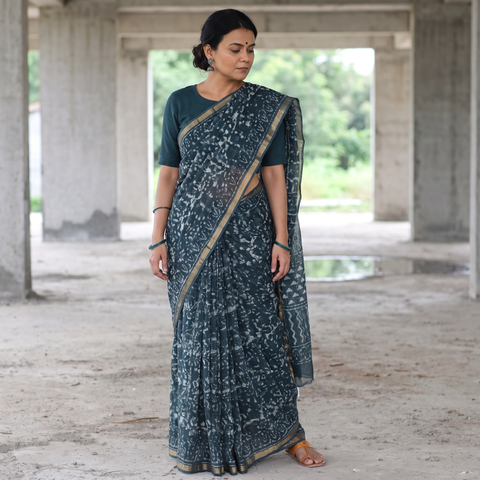 Green Batik Hand Block Print Kota Doria Cotton Saree, draped and worn by a woman, AI visual of the saree, iTokri