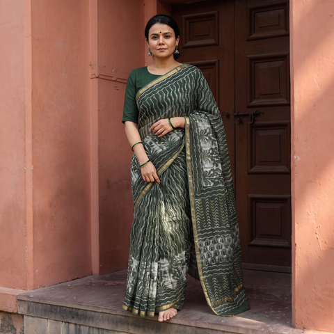 Green Batik Hand Block Print Kota Doria Cotton Saree, draped and worn by a woman, AI visual of the saree, iTokri