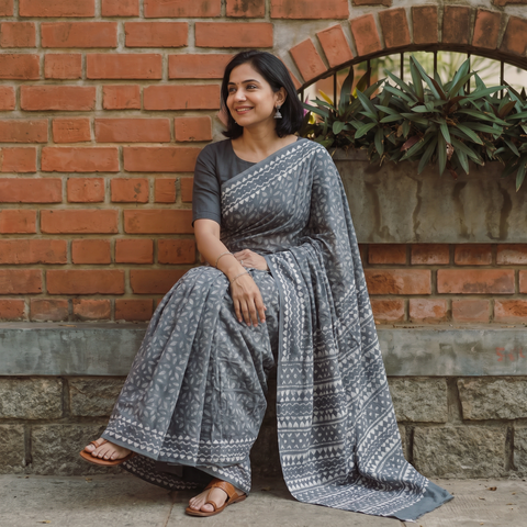 Grey Batik Hand Block Print Pure Mul Cotton Ready To Wear Saree, draped and worn by a woman, AI visual of the saree, iTokri