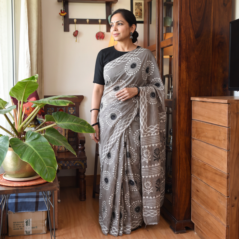 Grey Batik Hand Block Print Pure Mul Cotton Ready To Wear Saree, draped and worn by a woman, AI visual of the saree, iTokri