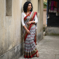 Grey Begampuri Handloom Cotton Saree, draped and worn by a woman, AI visual of the saree, iTokri
