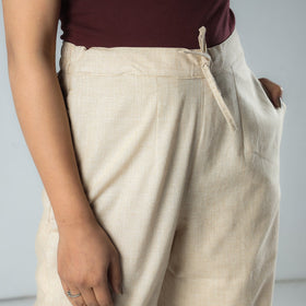 Cream - texture plain dyed cotton relaxed fit pant