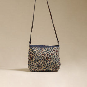 Handcrafted quilted ajrakh block printed fabric sling bag
