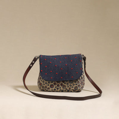 Handcrafted quilted ajrakh block printed fabric sling bag