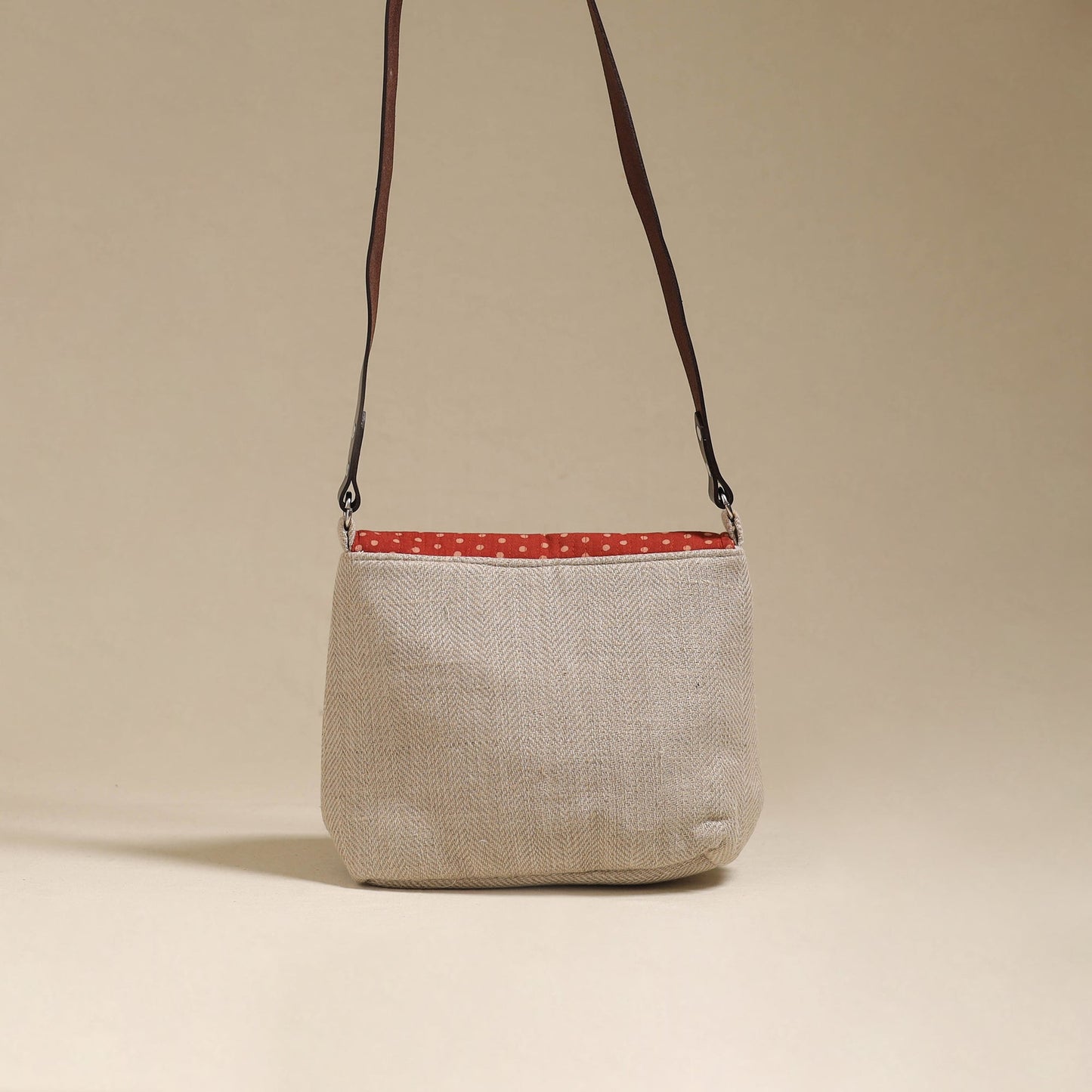 Handcrafted quilted ajrakh block printed fabric sling bag