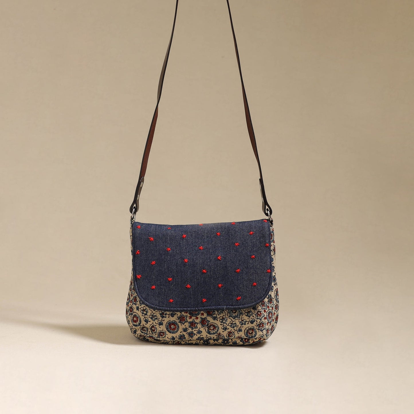 Handcrafted quilted ajrakh block printed fabric sling bag