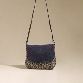 Handcrafted quilted ajrakh block printed fabric sling bag
