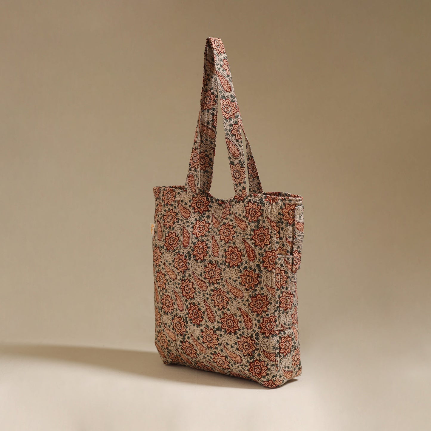 Handcrafted quilted kalamkari block printed fabric tote bag