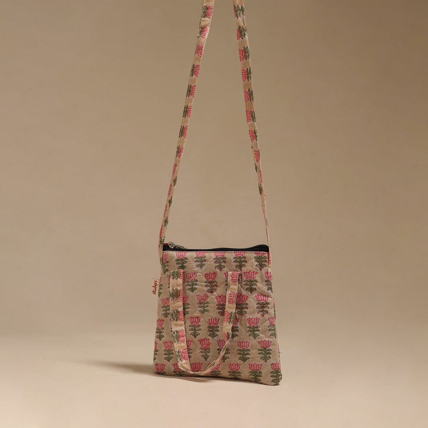 Handcrafted quilted sling bag 11