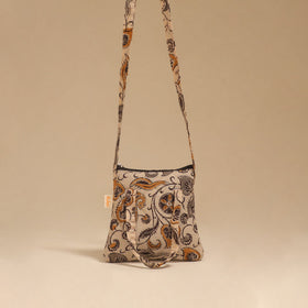 Handcrafted quilted sling bag 11