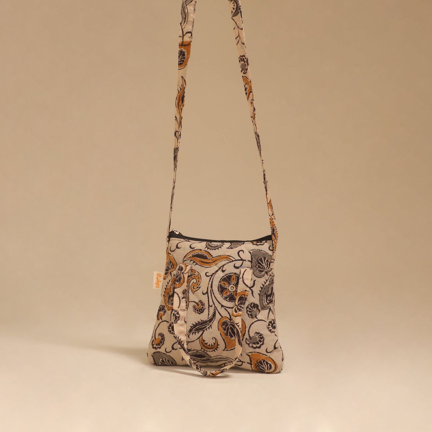 Handcrafted quilted sling bag 11