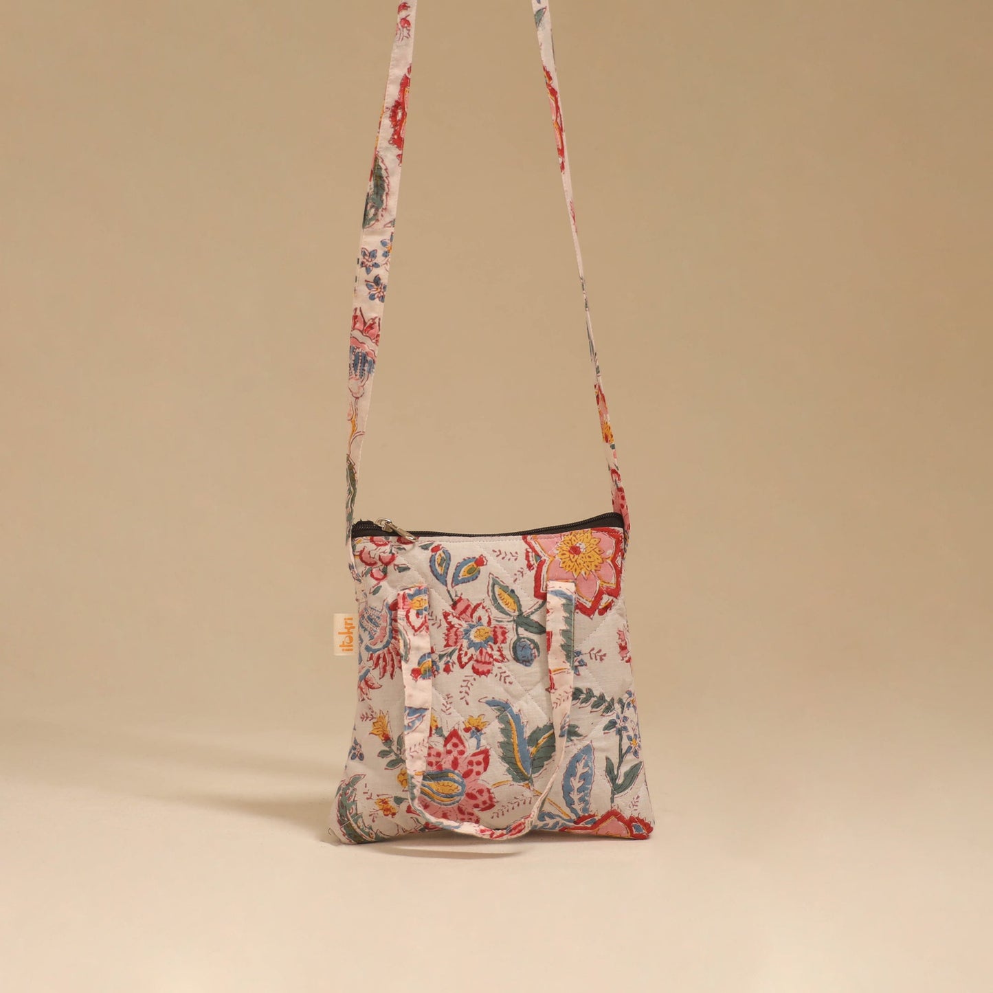 Handcrafted quilted sling bag 13