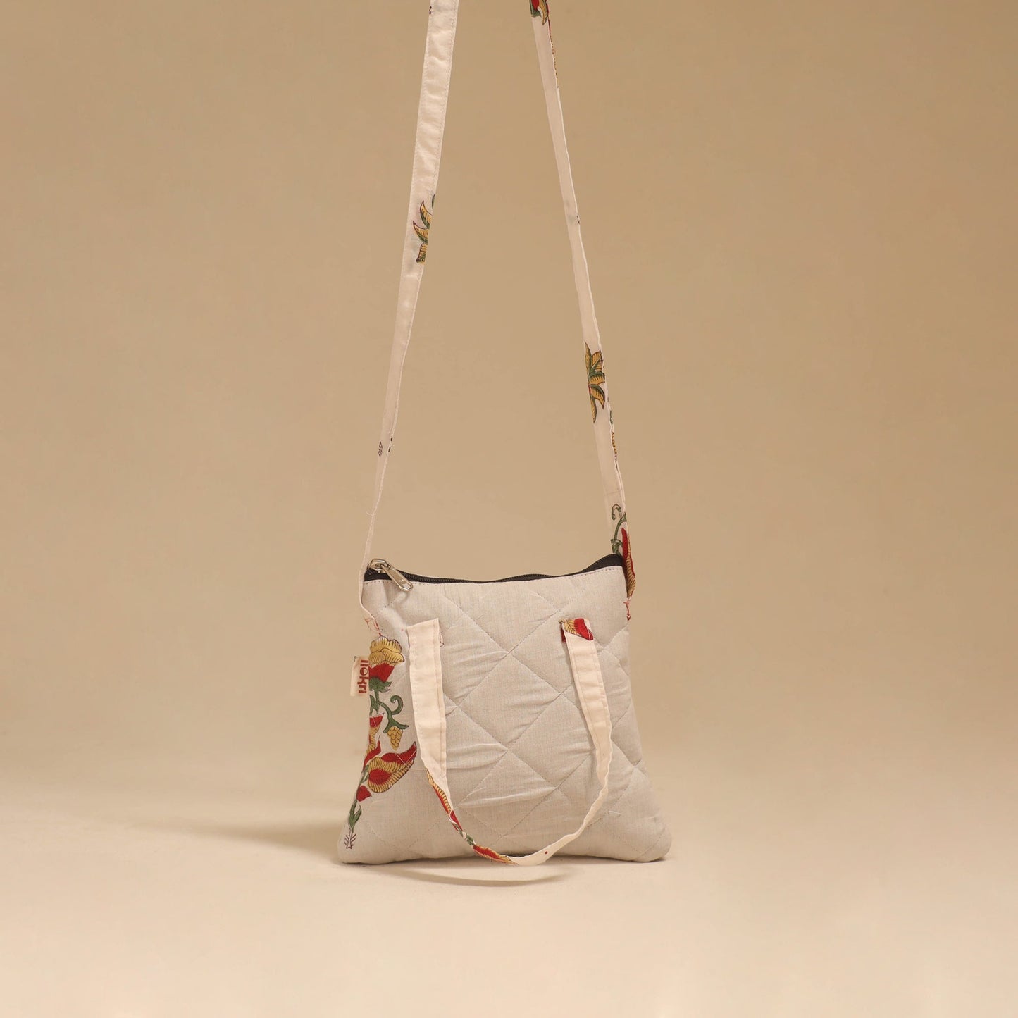 Handcrafted quilted sling bag 15