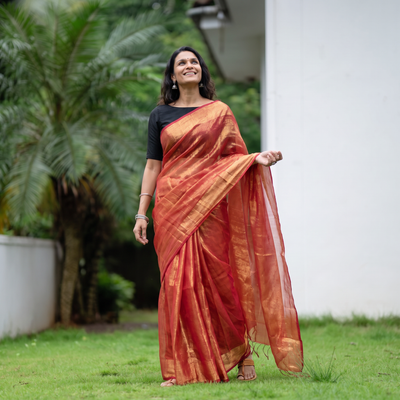 Red Bengal Fine Tissue Zari Saree, draped and worn by a woman, AI visual of the saree, iTokri