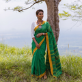 Green Bengal Handwoven Cotton Begumpuri Saree, draped and worn by a woman, AI visual of the saree, iTokri