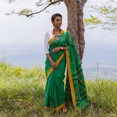 Green Bengal Handwoven Cotton Begumpuri Saree, draped and worn by a woman, AI visual of the saree, iTokri