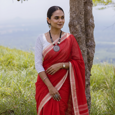 Red Bengal Handwoven Cotton Begumpuri Saree, draped and worn by a woman, AI visual of the saree, iTokri