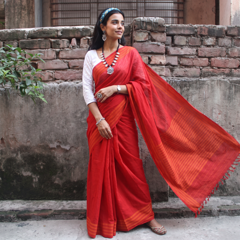 Red Bengal Handwoven Cotton Begumpuri Saree, draped and worn by a woman, AI visual of the saree, iTokri