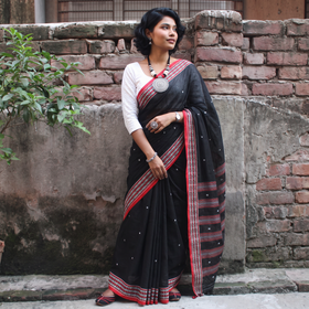 Black Bengal Handwoven Cotton Begumpuri Saree, draped and worn by a woman, AI visual of the saree, iTokri