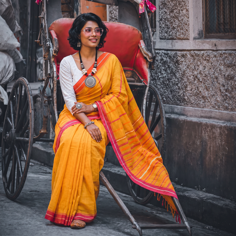Orange Bengal Handwoven Cotton Begumpuri Saree, draped and worn by a woman, AI visual of the saree, iTokri