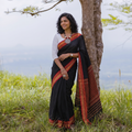 Black Bengal Handwoven Cotton Begumpuri Saree, draped and worn by a woman, AI visual of the saree, iTokri
