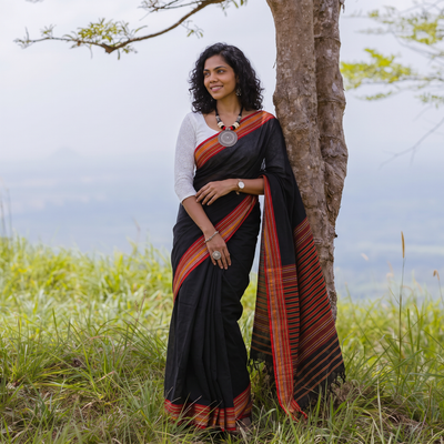 Black Bengal Handwoven Cotton Begumpuri Saree, draped and worn by a woman, AI visual of the saree, iTokri