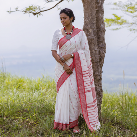 White Bengal Handwoven Cotton Begumpuri Saree, draped and worn by a woman, AI visual of the saree, iTokri