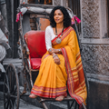 Yellow Bengal Handwoven Cotton Begumpuri Saree, draped and worn by a woman, AI visual of the saree, iTokri