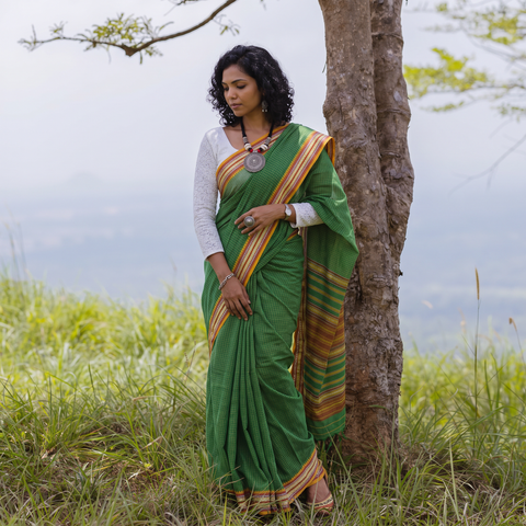 Green Bengal Handwoven Cotton Begumpuri Saree, draped and worn by a woman, AI visual of the saree, iTokri