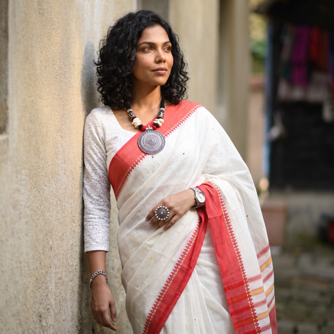 White Bengal Handwoven Cotton Begumpuri Saree, draped and worn by a woman, AI visual of the saree, iTokri