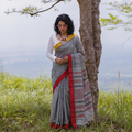 Grey Bengal Handwoven Cotton Begumpuri Saree, draped and worn by a woman, AI visual of the saree, iTokri