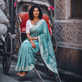 Green Bengal Handwoven Cotton Begumpuri Saree, draped and worn by a woman, AI visual of the saree, iTokri