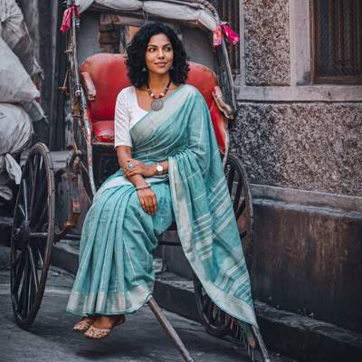 Green Bengal Handwoven Cotton Begumpuri Saree, draped and worn by a woman, AI visual of the saree, iTokri