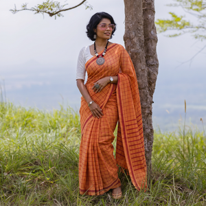 Orange Bengal Handwoven Cotton Checks Begumpuri Saree, draped and worn by a woman, AI visual of the saree, iTokri