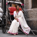 White Bengal Handwoven Cotton Heart Buti Begumpuri Saree, draped and worn by a woman, AI visual of the saree, iTokri
