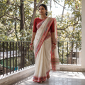Off White Bengal Handwoven Pure Cotton Begumpuri Saree for Durga Puja, draped and worn by a woman, AI visual of the saree, iTokri