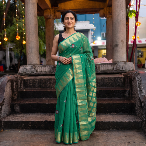Green Bengal Pure Cotton Zari Tant Handloom Saree, draped and worn by a woman, AI visual of the saree, iTokri