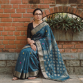 Green Bengal Pure Cotton Zari Tant Handloom Saree, draped and worn by a woman, AI visual of the saree, iTokri